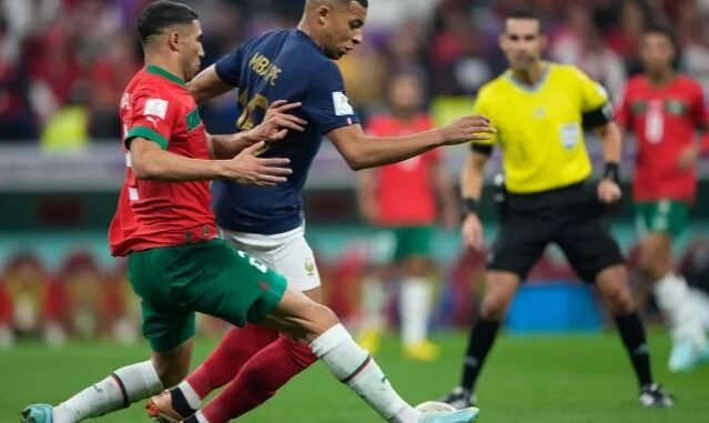France and Morocco players contest the ball during a FIFA World Cup 2026 quarterfinal match preview.