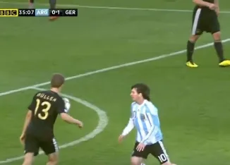 Thomas Muller challenges Lionel Messi during the 2010 FIFA World Cup quarterfinal