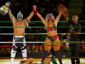 La Hiedra and Laredo Kid celebrate winning AAA Mixed Tag Team titles