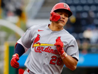 Cincinnati Reds players celebrate impressive 4-2 victory over St. Louis Cardinals
