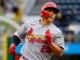 Cincinnati Reds players celebrate impressive 4-2 victory over St. Louis Cardinals