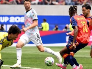 Rodri and Dani Olmo celebrate during Spain's 2-1 victory over Belgium in the FIFA World Cup 2026 quarterfinal.