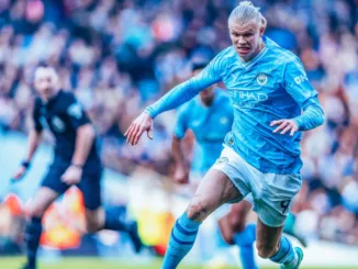 Erling Haaland in action for Manchester City against Liverpool